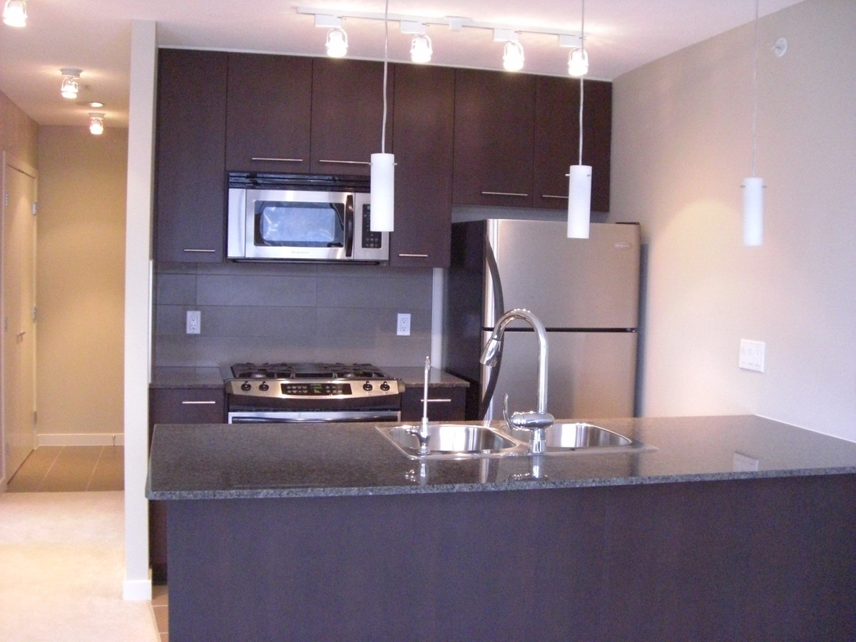 Kitchen at 1002 - 2979 Glen Dr, Coquitlam Center, Coquitlam